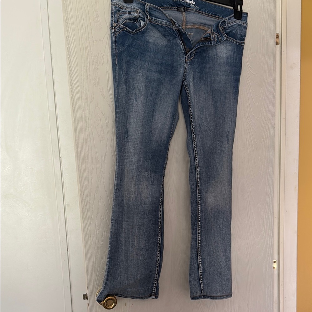 Blue Boot Cut Jeans with Natural Fading
